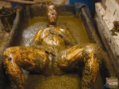 A mess results after cleaning, and the girl is caught in cowshit.